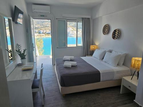 Postel nebo postele na pokoji v ubytování Galazio Rooms & Suites