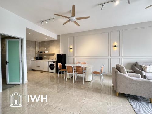 a living room with a table and a couch at ICC Ipoh Town Premium Suites By IWH Suites in Ipoh