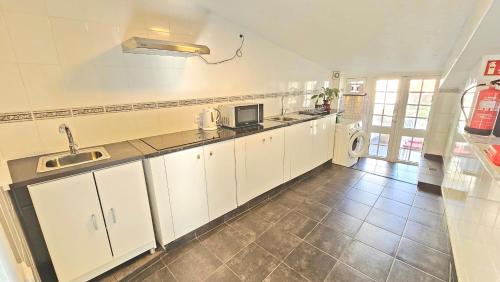 Kuchyň nebo kuchyňský kout v ubytování K&K Apartment
