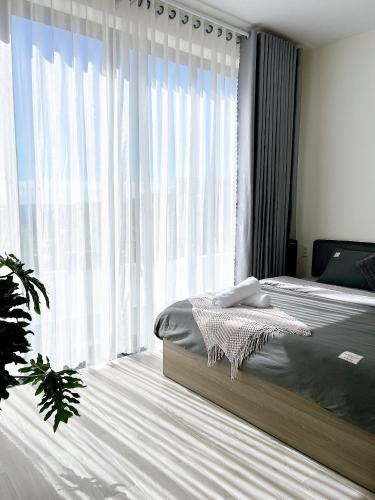 Ένα ή περισσότερα κρεβάτια σε δωμάτιο στο GaUn Hill Villa