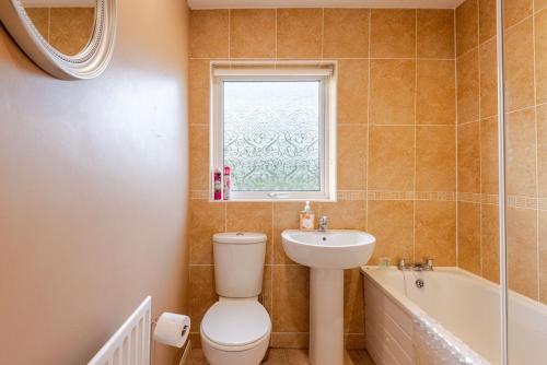 Ένα μπάνιο στο Comber Cozy Home
