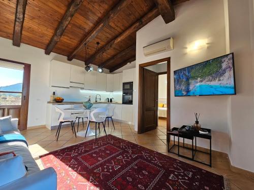 TV a/nebo společenská místnost v ubytování L'isola del Relax