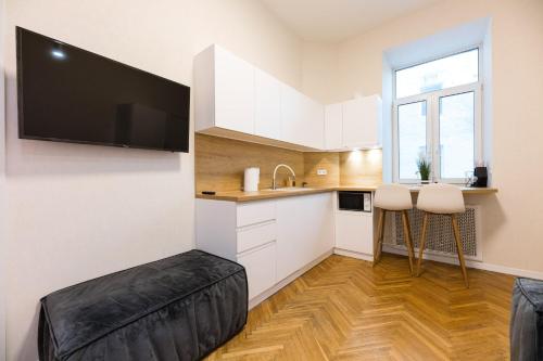 Η κουζίνα ή μικρή κουζίνα στο Kyiv Scandi Apartment