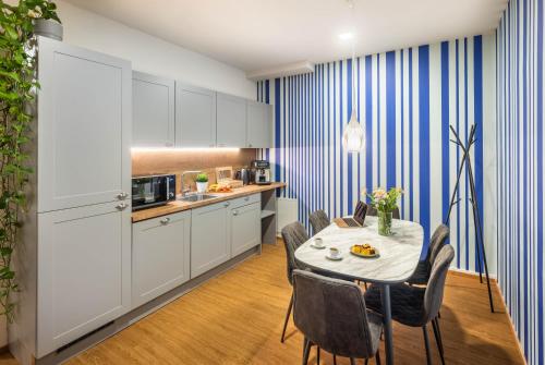 Citadines South Viennaにあるキッチンまたは簡易キッチン