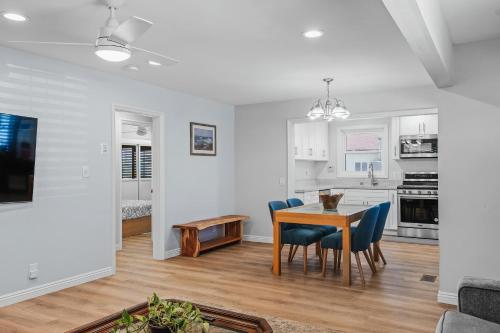 a kitchen and dining room with a table and chairs at Peaceful Getaway with Renovated Amenities in San Diego