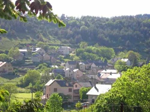a small town with houses on a hill at Gîte Gîte Agnès 2/3 personnes in Laval-du-Tarn