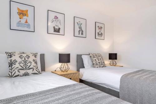 Ένα ή περισσότερα κρεβάτια σε δωμάτιο στο Bluebell House Retreat in Peterborough