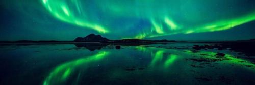an image of the northern lights in the sky at Fisherman`s Cabin Lofoten in Ballstad