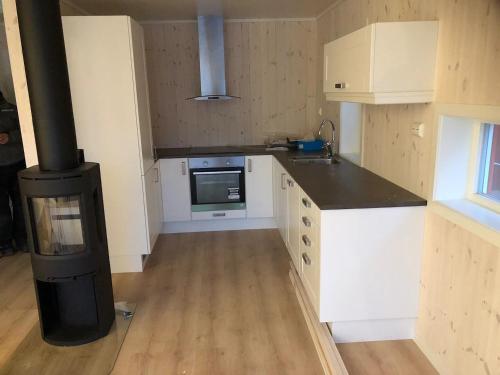 Kuchyň nebo kuchyňský kout v ubytování Fisherman`s Cabin Lofoten