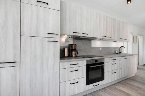 Kuchyň nebo kuchyňský kout v ubytování Ferienhaus Flut