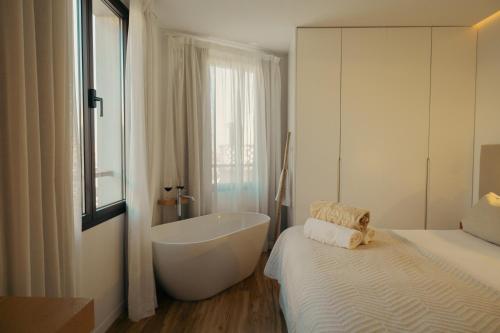 Postel nebo postele na pokoji v ubytování Ynaira hotel & Spa