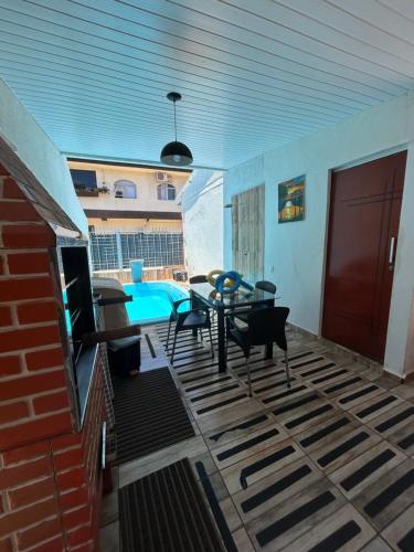 Πισίνα στο ή κοντά στο Casa Aconchego & Piscina - Foz do Iguaçu