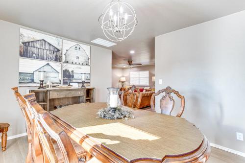 a kitchen and dining room with a table and chairs at 4 Mi to Dtwn Guthrie Family Home with Fire Pit! in Guthrie