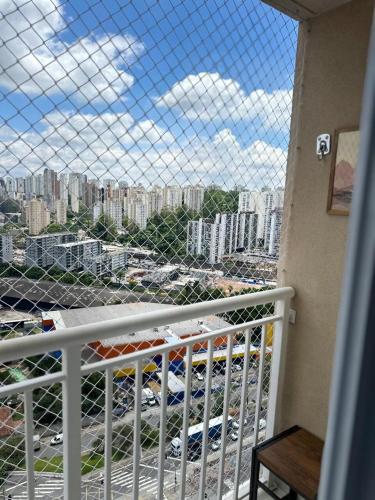 a balcony with a view of a city at Studio proximo á estacão Giovanni, Vibra São Paulo, Transamerica Expo Center in Sao Paulo