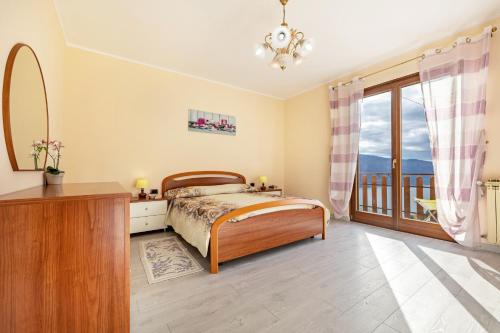 Ένα ή περισσότερα κρεβάτια σε δωμάτιο στο Casa Elena