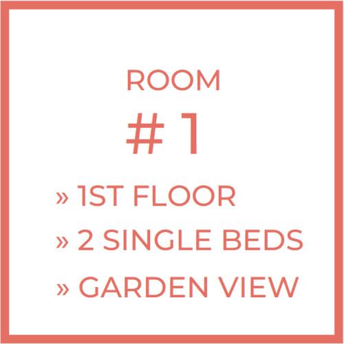 a sign with the words room floor and single beds garden view at Casa Da Piedade in São Vicente