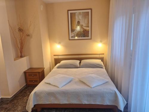 Hotel w Dobieszkowieにあるベッド