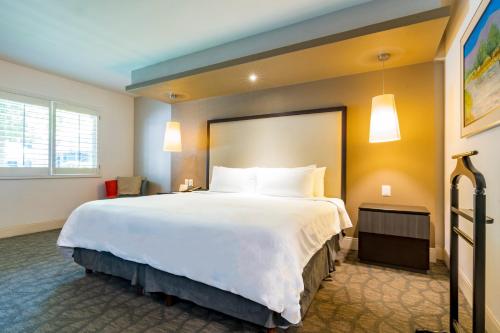 Postel nebo postele na pokoji v ubytování Hotel Lucerna Mexicali