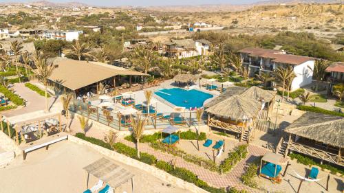 an aerial view of a resort with a swimming pool at El Refugio de Vichayito in Vichayito