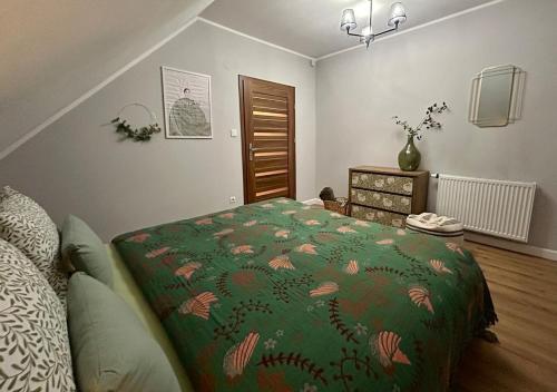 Ένα ή περισσότερα κρεβάτια σε δωμάτιο στο Borki Guest House