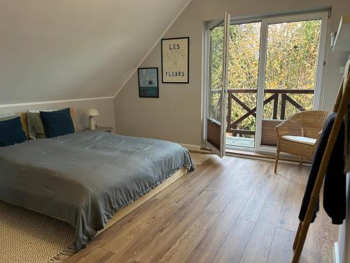 Ένα ή περισσότερα κρεβάτια σε δωμάτιο στο Borki Guest House