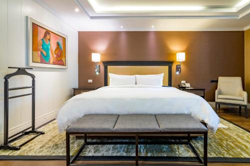 Postel nebo postele na pokoji v ubytování Hotel Lucerna Mexicali