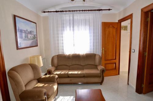 Χώρος καθιστικού στο Villa de hermanos