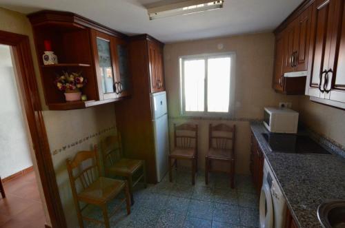 Η κουζίνα ή μικρή κουζίνα στο Villa de hermanos