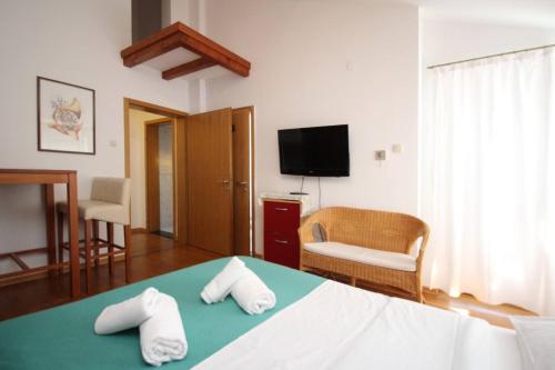 Posteľ alebo postele v izbe v ubytovaní Apartments Wow Barbalic