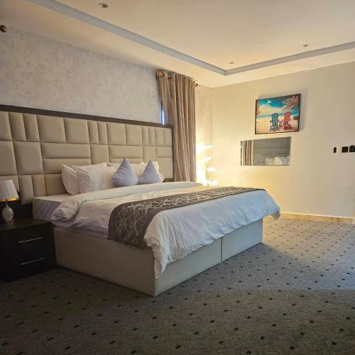 Ένα ή περισσότερα κρεβάτια σε δωμάτιο στο Anibex Luxe Apartment