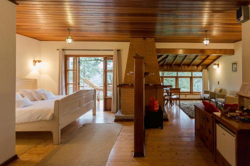 Postel nebo postele na pokoji v ubytování Hotel Fazenda Itapuá