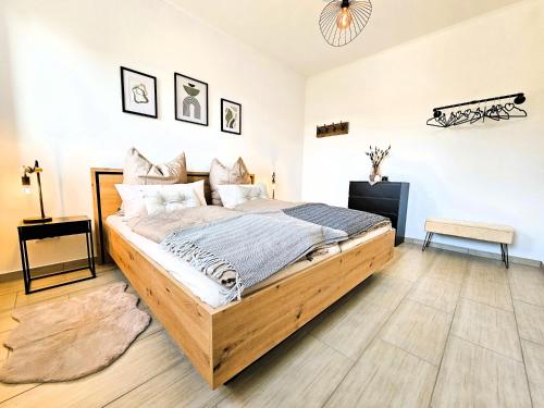 Postel nebo postele na pokoji v ubytování Ferienwohnung Lüttje Sünnschien Timmel