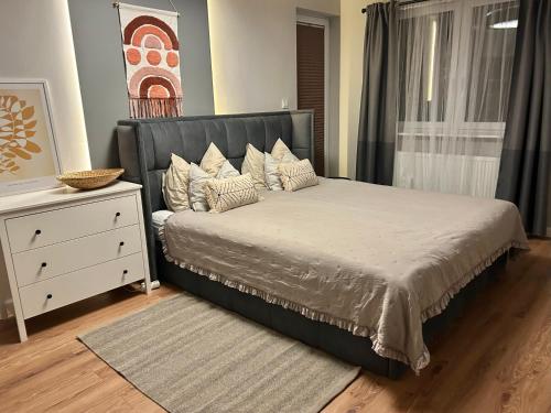 Ένα ή περισσότερα κρεβάτια σε δωμάτιο στο Borki Guest House