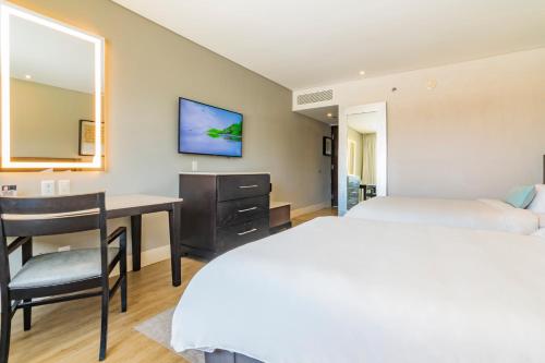 Hotel Lucerna Hermosilloにあるベッド