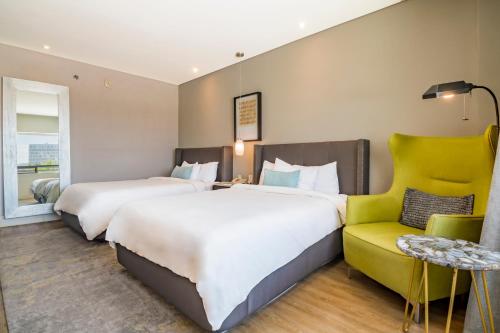 Hotel Lucerna Hermosilloにあるベッド