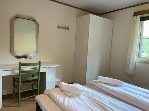Postel nebo postele na pokoji v ubytování Brekke Apartments