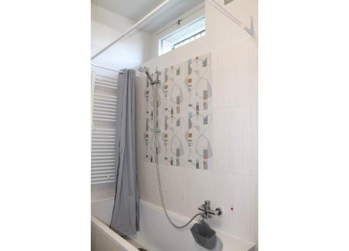 a bathroom with a shower and a sink at Belvedere ONE in Brezzo