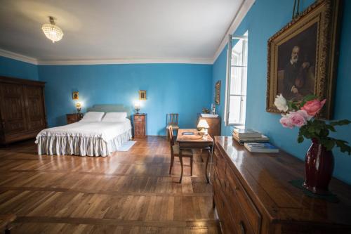 Postel nebo postele na pokoji v ubytování Palazzo Lantieri