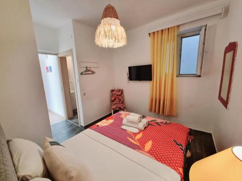 Postel nebo postele na pokoji v ubytování Kumbahçe Fethiye Hanım Pansiyon BODRUM