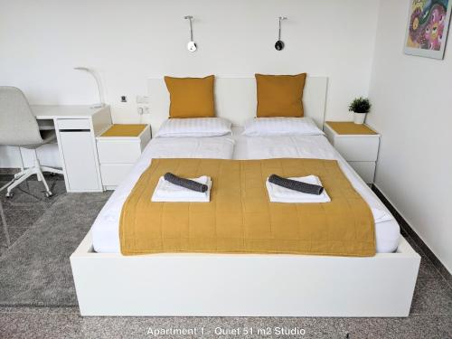Posteľ alebo postele v izbe v ubytovaní ClearVueHome Apartments Bratislava Slavin