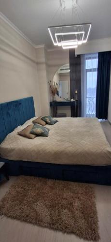 Postel nebo postele na pokoji v ubytování Alvina Apartment