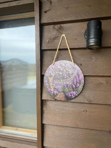 a door with a sign that says welcome on it at Crabmill glamping bewdley in Bewdley