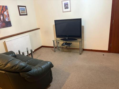Televisyen dan/atau pusat hiburan di Queens Hotel Stonehaven