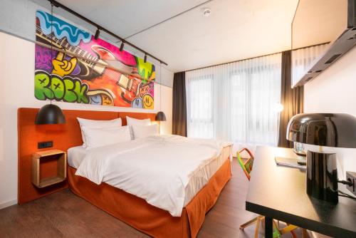 Postel nebo postele na pokoji v ubytování The Barthels Boutique Hotel