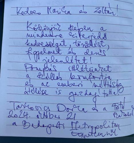 a letter written in cursive handwriting on lined paper at Palócliget Vendégház in Kétbodony