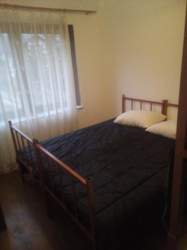 Postel nebo postele na pokoji v ubytování apartman SM IK 4