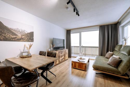 Televízia a/alebo spoločenská miestnosť v ubytovaní Apart Peak Ötztal