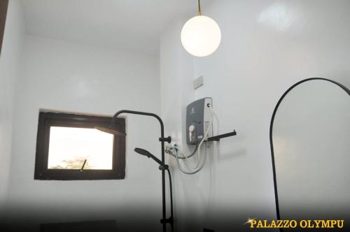 Ένα μπάνιο στο Palazzo Olympu Guest House