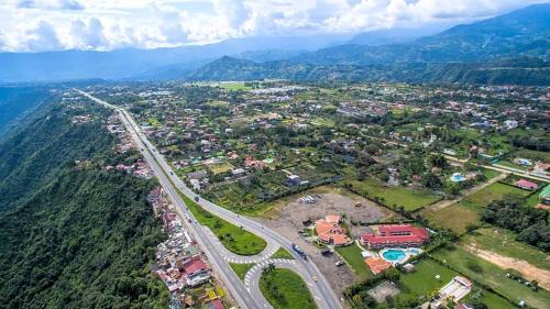 an aerial view of a city with a highway at Praia 2 in Fusagasuga