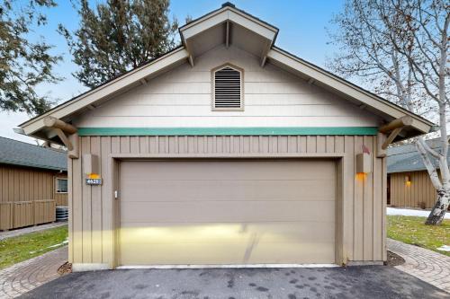 a garage with a large garage door at The Hawk Nest in Klamath Falls